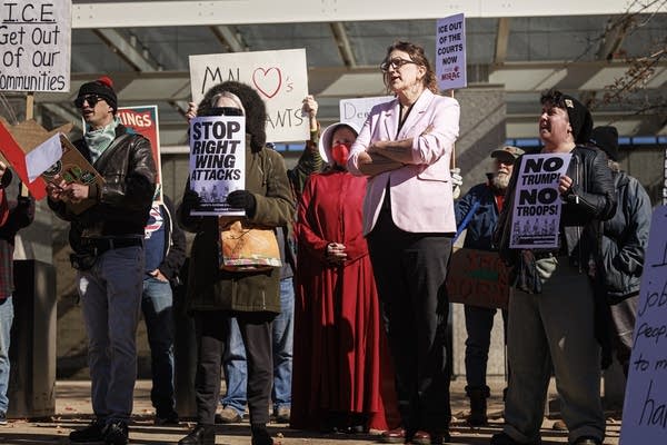 A group gathers to protest Kristi Noems visit