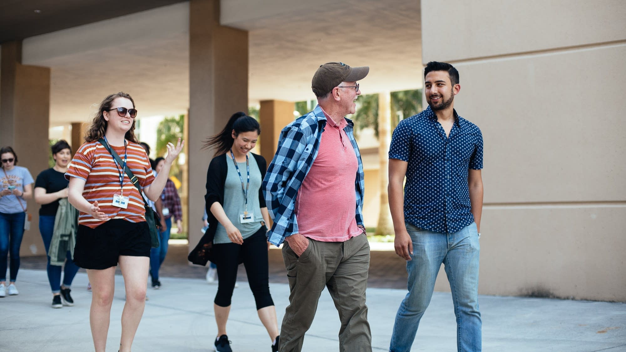 Participants gather for a lecture on the FIU campus.