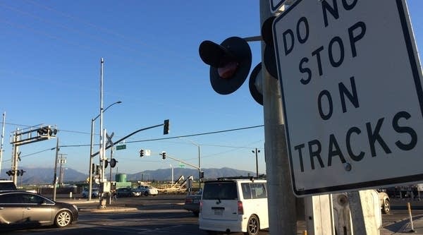 Many signs indicate the danger at the site of a deadly 2015 accident in Oxnard, California, where a truck driver turned his vehicle onto railroad tracks.