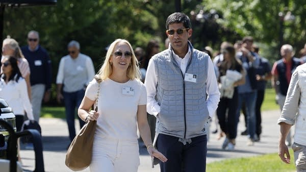 Above, Kevin Warsh in 2024 next to Eventbrite CEO Julia Hartz at the Allen & Company Sun Valley Conference in Idaho.