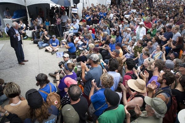 A man talks to a crowd. 