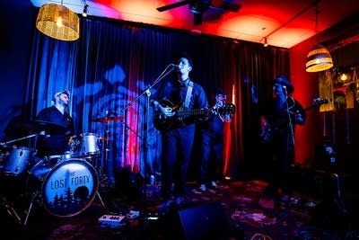 A band performing onstage