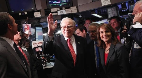 Berkshire Hathaway Chairman and CEO Warren Buffett stands on the floor of the New York Stock Exchange after ringing the opening bell on September 30, 2011 in New York City.