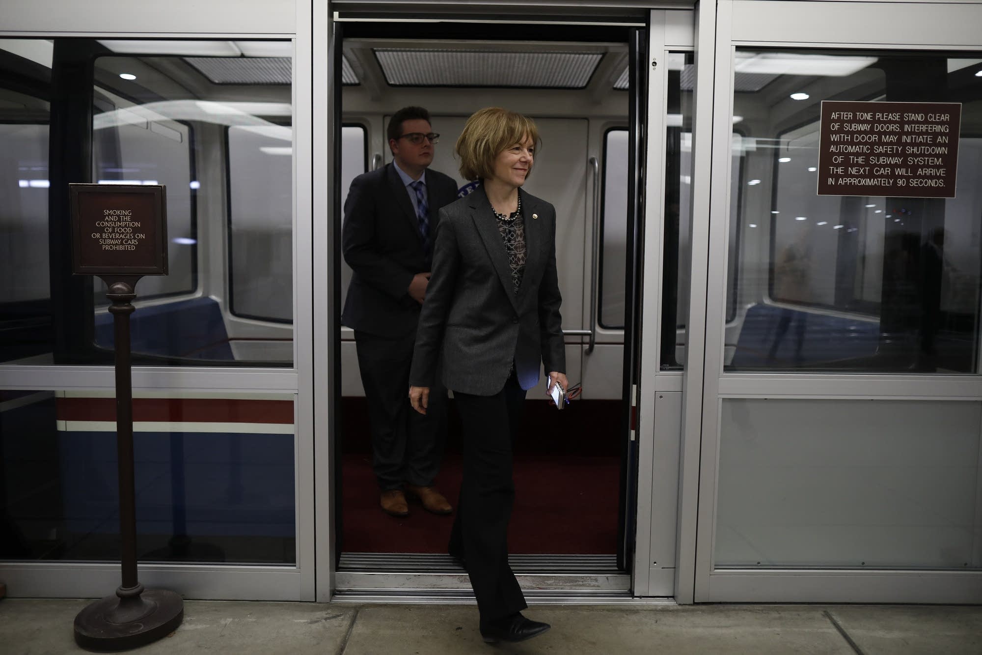 Sen. Tina Smith (D-MN) walks to a Democratic Caucus meeting at the Capitol.