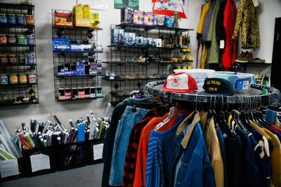 Apparel and posters on display in a record store