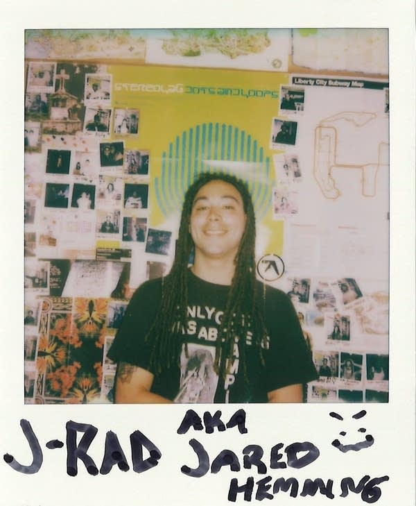 a signed polaroid with a man in it