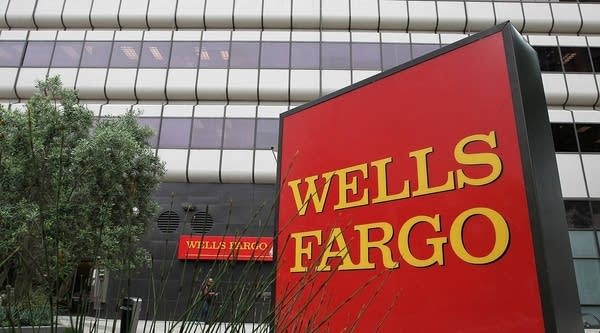 A sign is posted in front of a Wells Fargo Bank branch on July 19, 2011 in Oakland, Calif. Wells Fargo and Citibank both posted their quarterly earnings today.