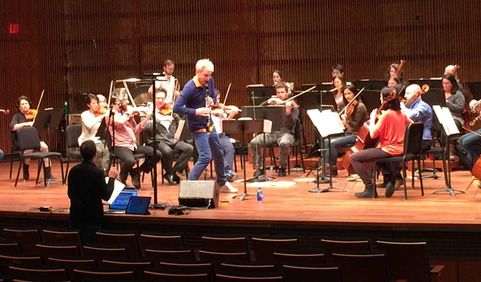 SPCO Artistic Partner Martin Frost uses his hip to create a sound