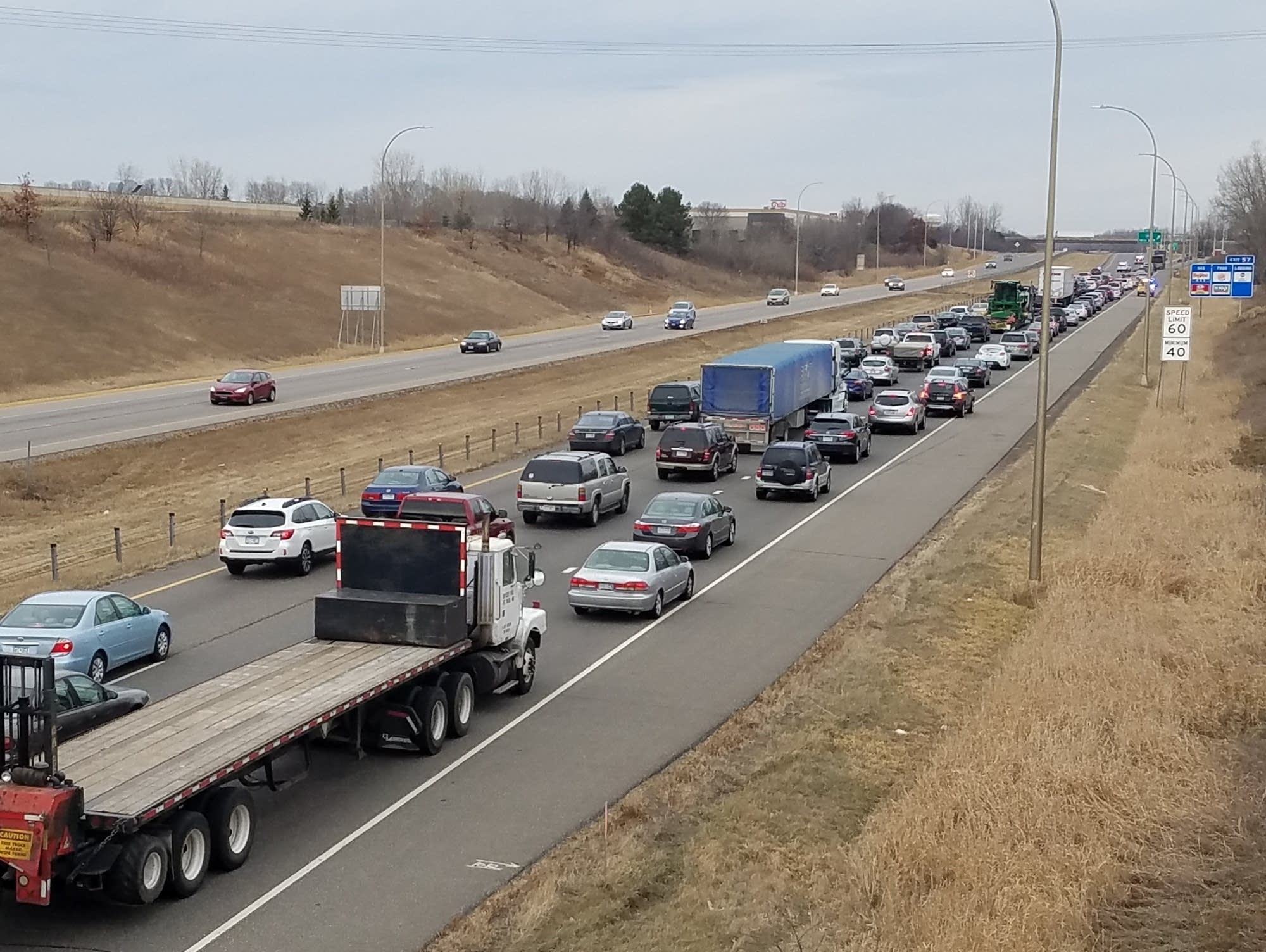 Traffic backs up along Interstate 694 near Oakdale