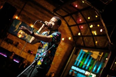 A musician raps onstage