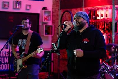 Two people performing in store