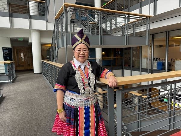 hmong elder poses for a portrait