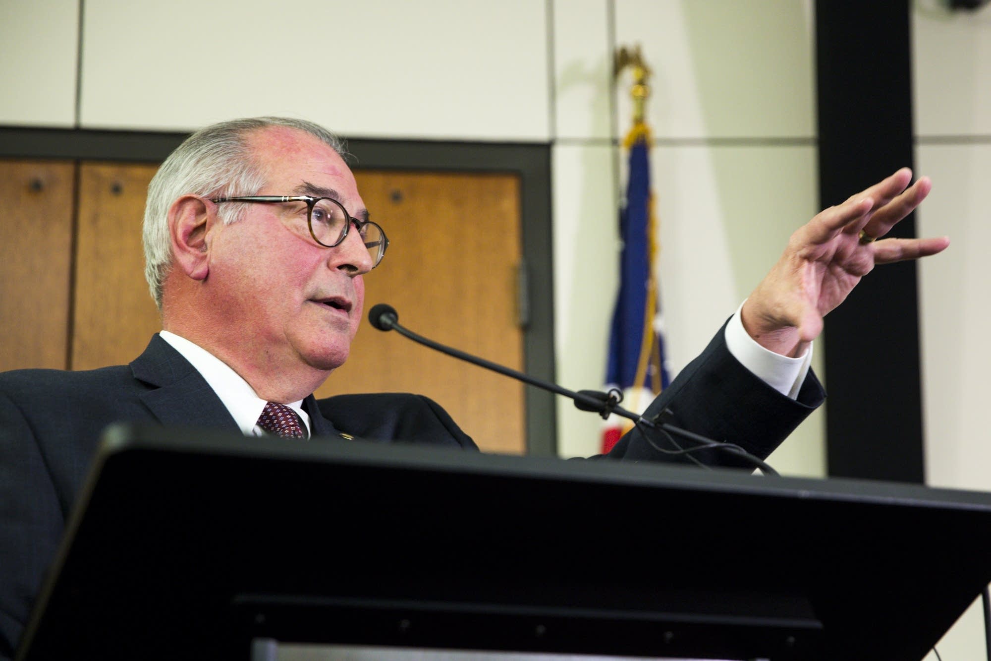 Hennepin County Attorney Mike Freeman points to a reporter