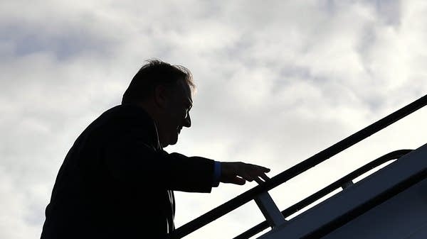 US Secretary of State Mike Pompeo boards a plane before departing from London Stansted Airport, north of London, on May 9, 2019. - US Secretary of State Mike Pompeo on May 9, 2019, put off a visit to Greenland, citing pressing business in Washington -- just two days after he also ditched a trip to Germany to fly to Iraq amid soaring tensions with Iran.