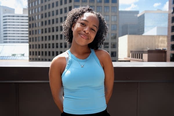 A young woman poses for a portrait