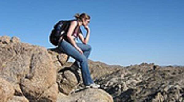 Stacey Vanek Smith thinking about shoes.