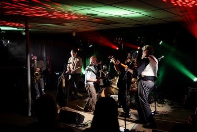 A band performing onstage