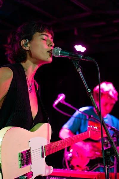 Miya Folick and guitarist on stage