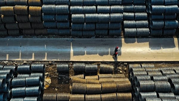 Above, a steel market in northeastern China.