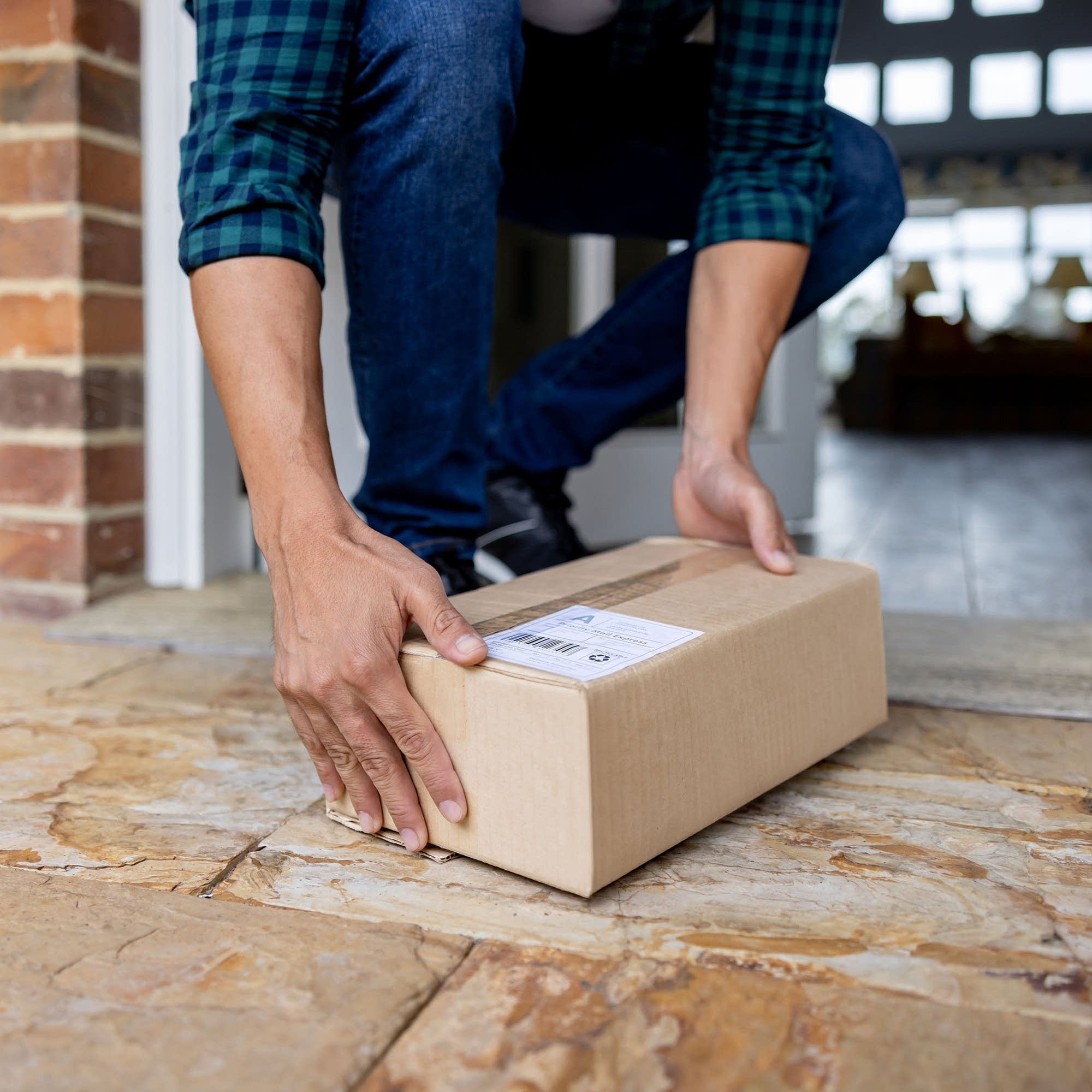 Postal services around the world hit pause on shipments to the U.S.
