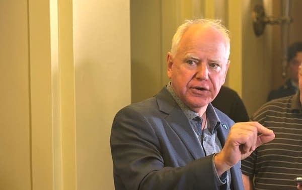 A man speaks with media