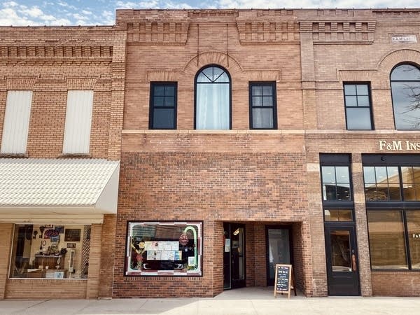 The facade of a brick building.