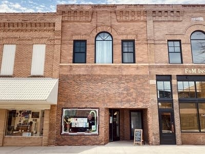 The facade of a brick building.