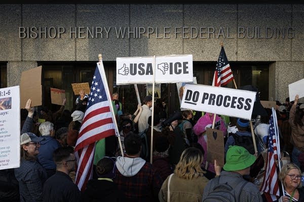 protestors gathering outside federal building