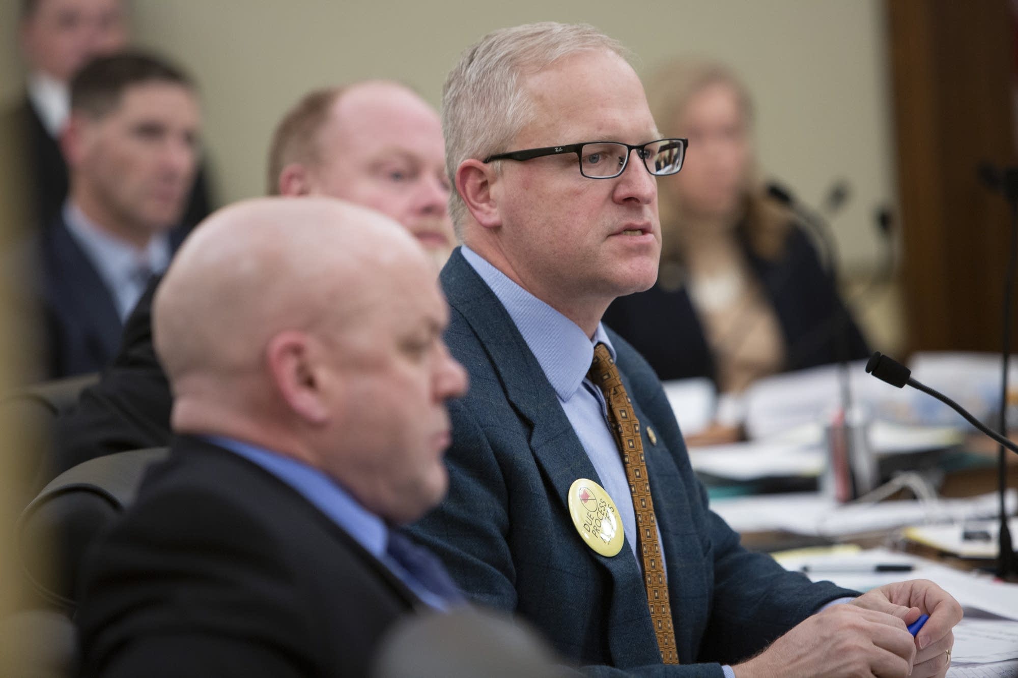 Rep. Jim Nash, R-Waconia, (right) comments on a gun control measure.