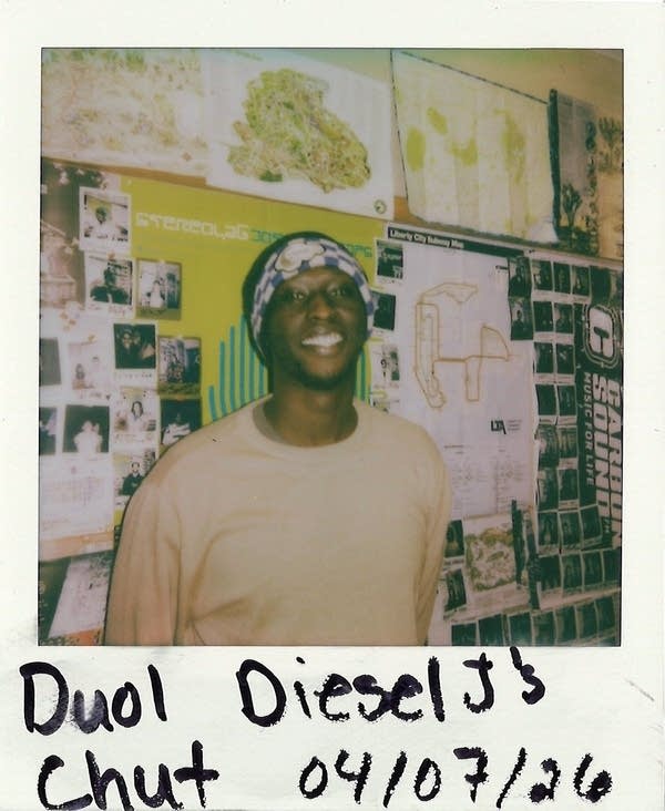 man posing in a polaroid photo