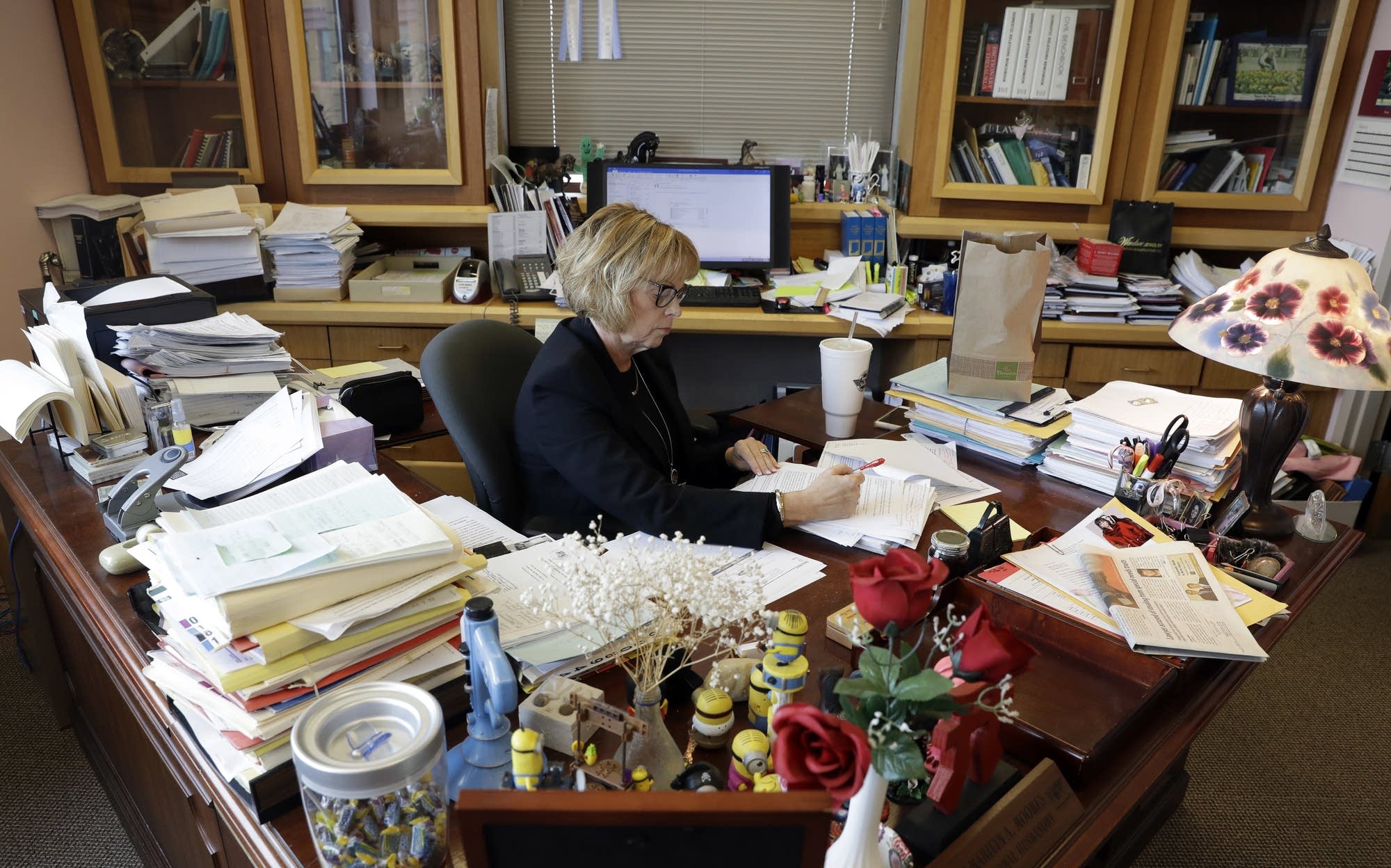 Judge Marilyn Moores works in her office.