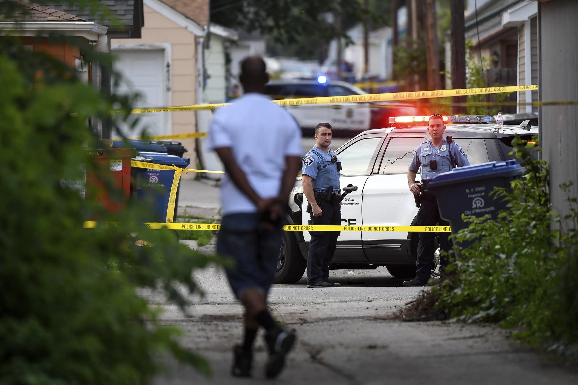 John Thompson arrives at the scene of an officer-involved shooting.