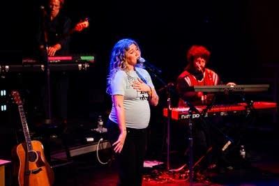 Your Smith and band performing on stage