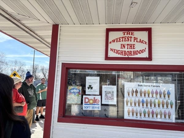 Signs on building display ice cream flavors and other messages