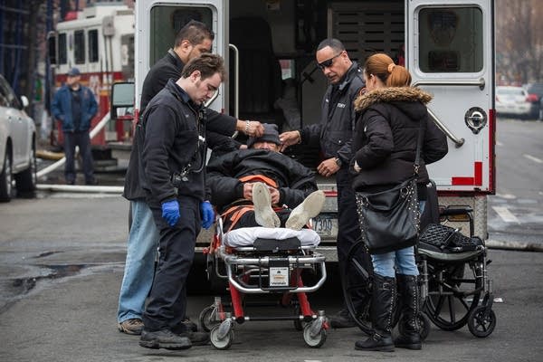 Loaded into an ambulance