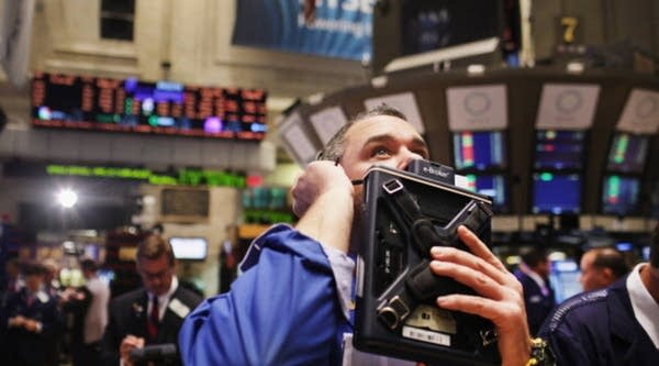 A trader works on the floor of the New York Stock Exchange during morning trading on Sept. 22, 2011 in New York City.