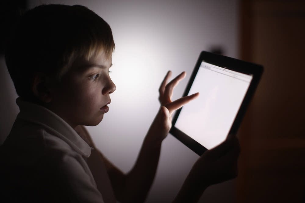 Children interacting with tablet