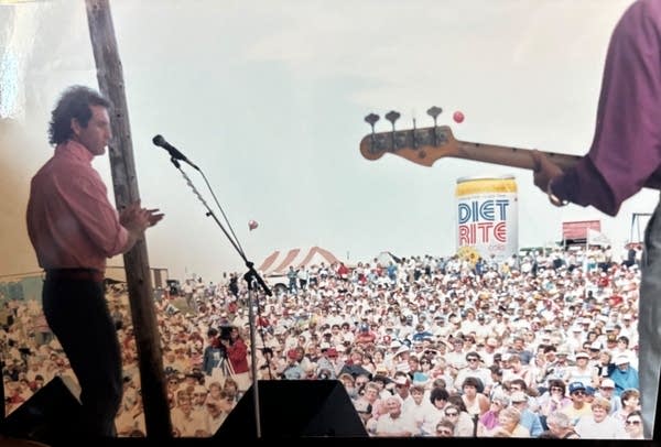 A band performs to a crowd.