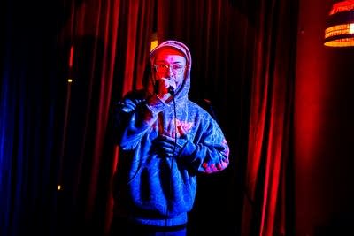A rapper performing onstage