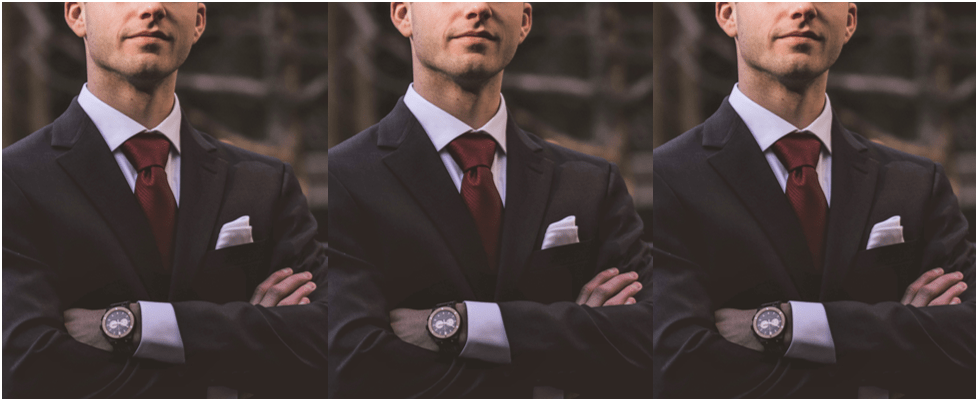 man in suit cropped below the eyes