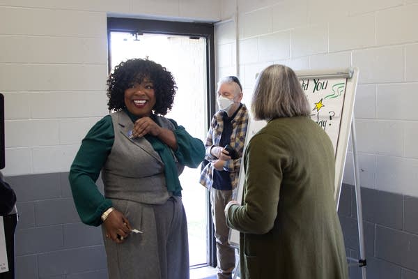 A person walks in to vote