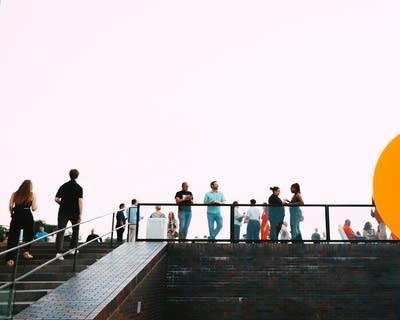 people on the rooftop of the walker art center