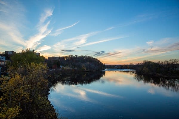 The sunset sky reflects off the Chippewa River on the University of Wisconsin- Eau Claire campus on Tuesday, Nov. 1, 2016.