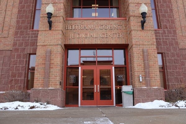 Exterior of a red brick building.