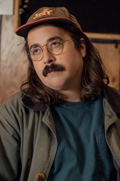 Dan Hornsby wears a baseball cap and barn jacket.