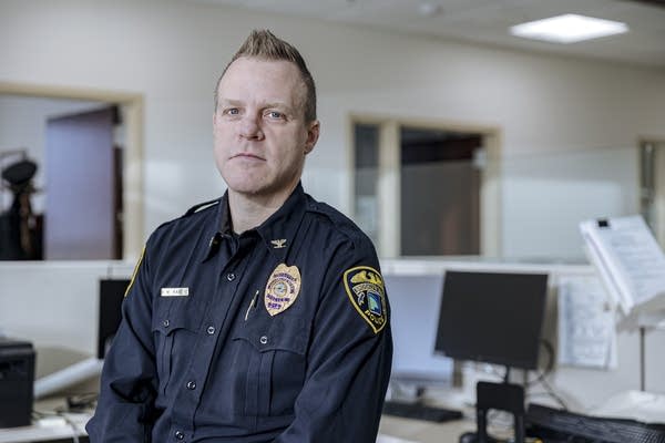 A person poses for a portrait