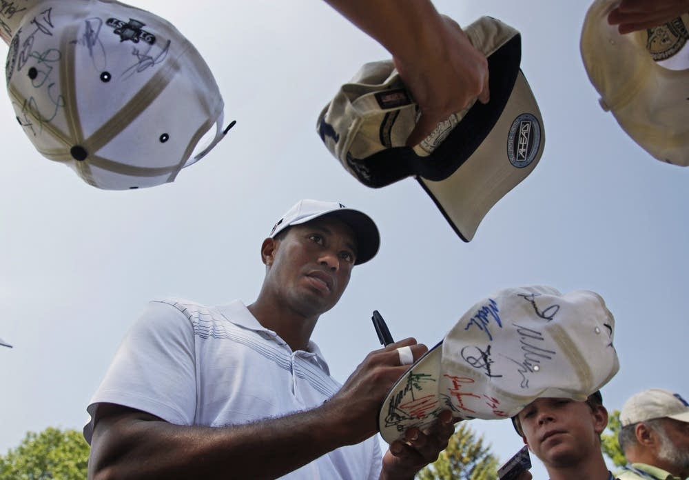 Signing autographs