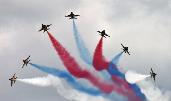 South Korea's Black Eagles aerobatics team perform an aerial display during a preview at the Singapore Airshow at Changi exhibition center in Singapore on February 14, 2016.  The Singapore Airshow 2016 begins on February 16 to 21.   AFP PHOTO / ROSLAN RAHMAN / AFP / ROSLAN RAHMAN        (Photo credit should read ROSLAN RAHMAN/AFP via Getty Images)