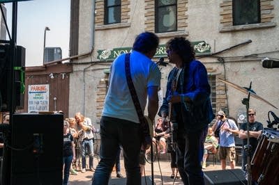 people playing music outdoors