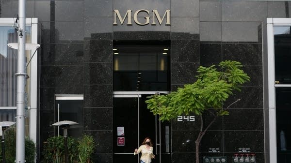 A person walks out of the Metro-Goldwyn-Mayer (MGM) Studios office building on May 26, 2021 in Beverly Hills, California.